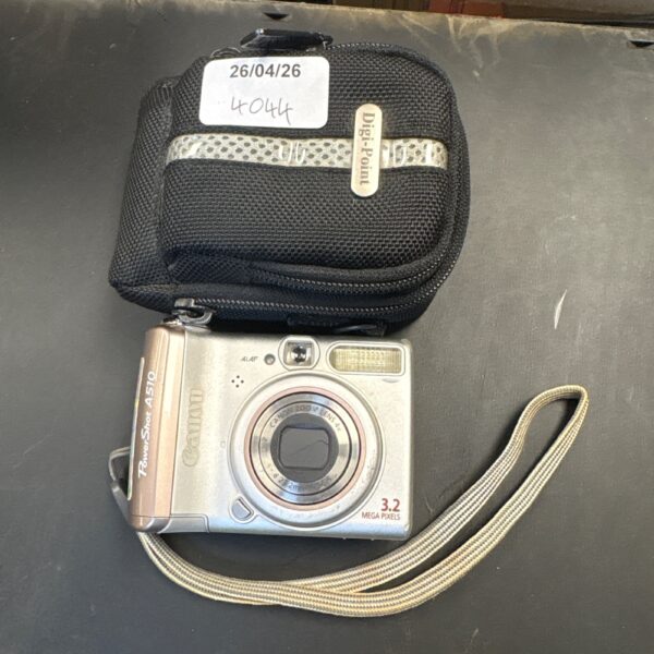 Silver Canon Powershot A510 digital camera with protective case.