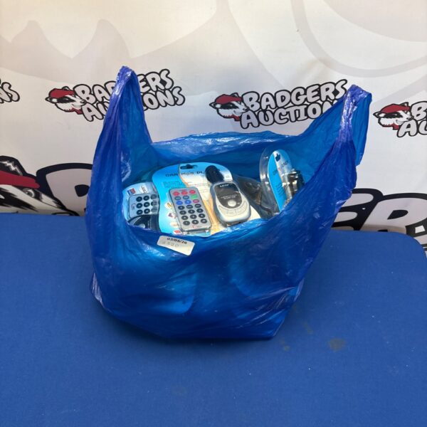 Lot of new car MP3 players in plastic packaging.