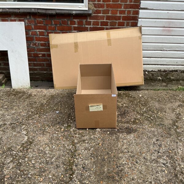 Lot of fourteen cardboard storage boxes for moving and storage.