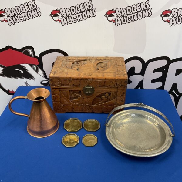 Antique carved oriental box with copper pitcher and silver basket.