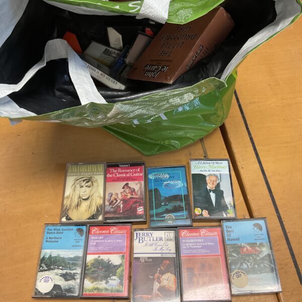 Mixed lot of vintage cassette tapes for retro audio enjoyment.