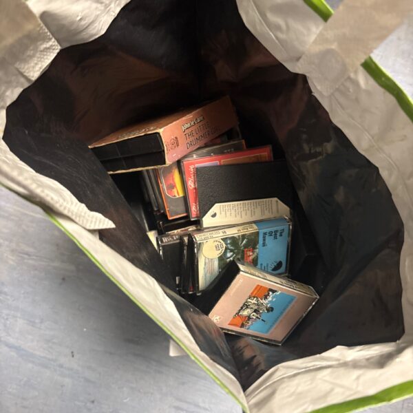 Mixed lot of vintage cassette tapes for retro music lovers.