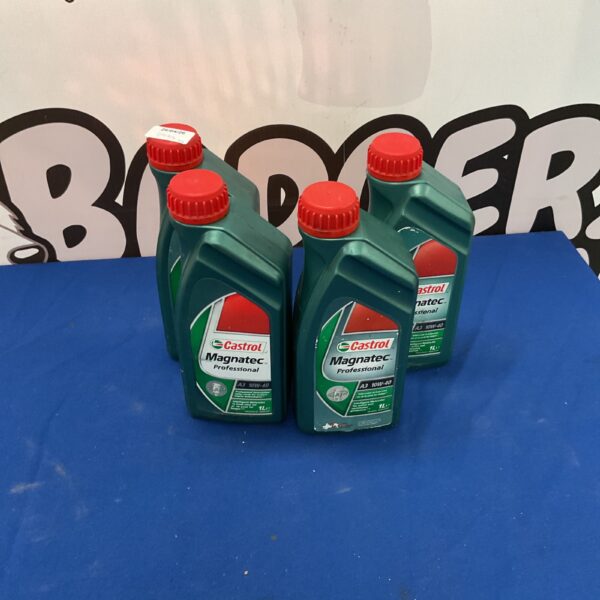 Four bottles of Castrol Magnatec 5W-30 engine oil for automotive use.