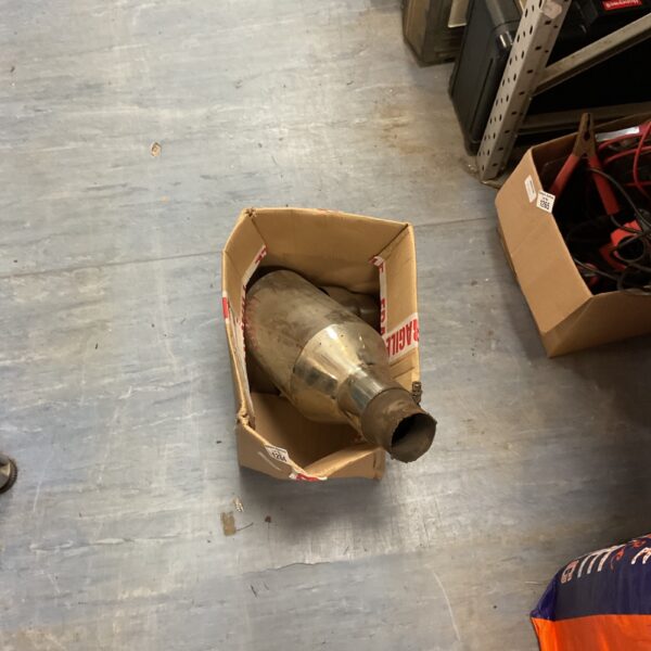 Used catalytic converter for vehicle exhaust system repair.