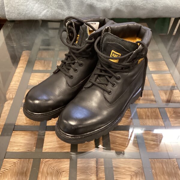 Black leather Caterpillar boots size 7, showing wear.