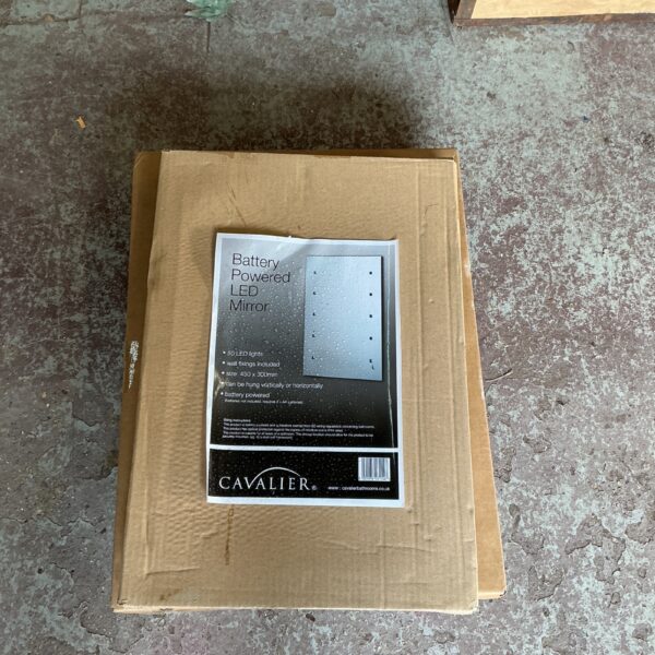 Cavalier battery operated mirror with LED lighting for bathroom use.