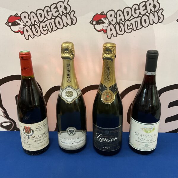Mixed lot of French champagne and wine bottles.