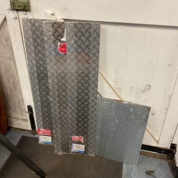 Chequer plate and pegboard lot for workshop storage and DIY projects.