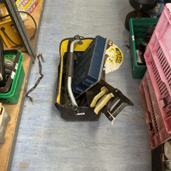 Heavy-duty chimney sweep tool bag with compartments and straps.