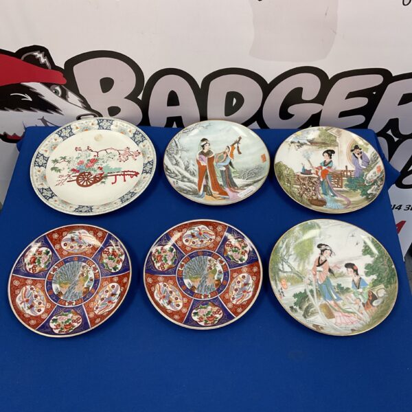 Lot of six antique Chinese and Japanese porcelain plates with floral designs.