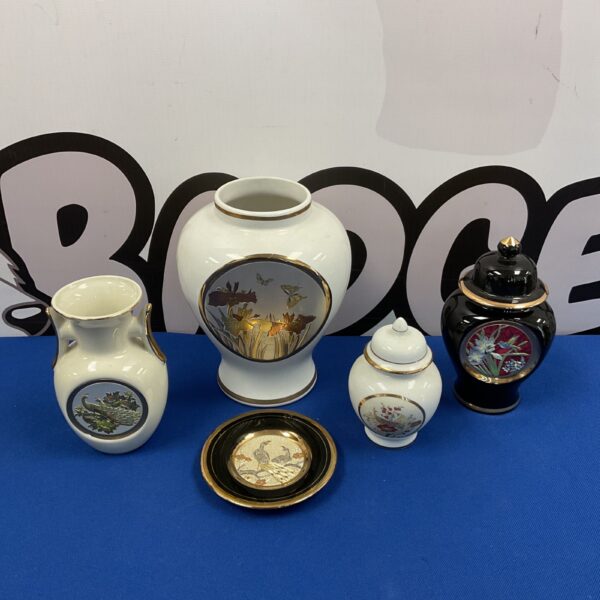 Collection of colourful hand-painted Chokin porcelain jars and vase.