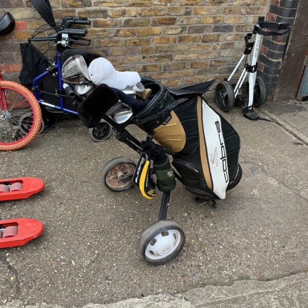 Cobra King golf clubs and trolley set for sale.