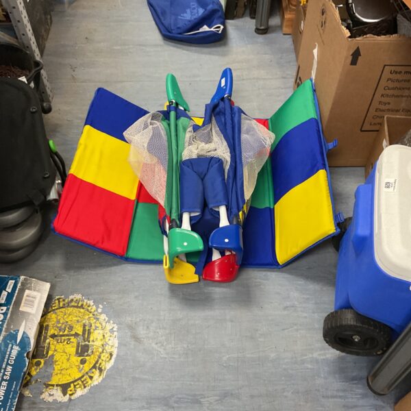 Colourful foldable playpen for babies and young children.