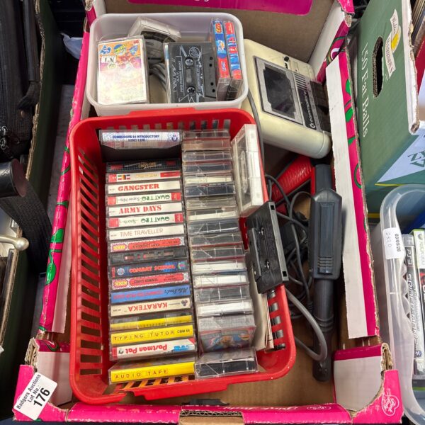 Vintage Commodore Datassette with cassette tapes for retro gaming.