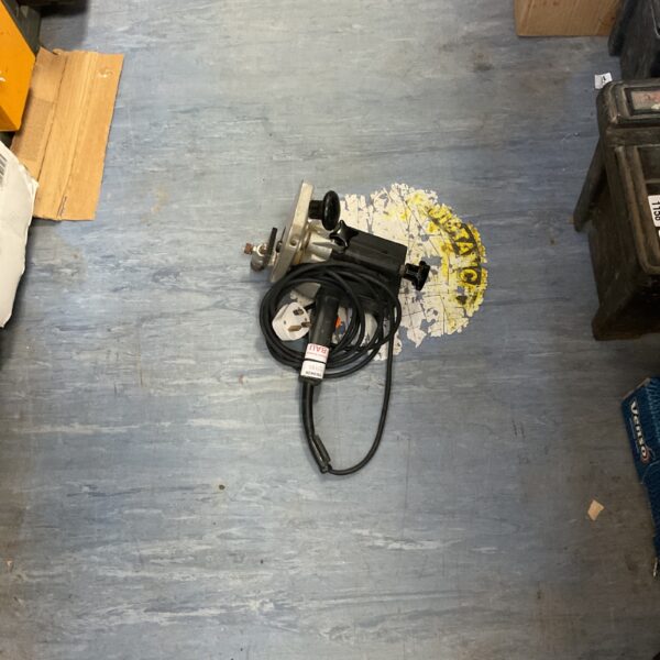 Corded power router tool for woodworking projects.