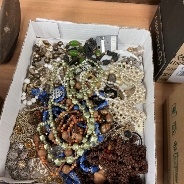 Colourful costume jewellery tray with bead necklaces and strands.