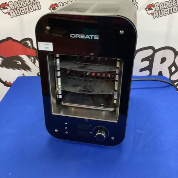 Compact Creat portable table top grill for convenient cooking.