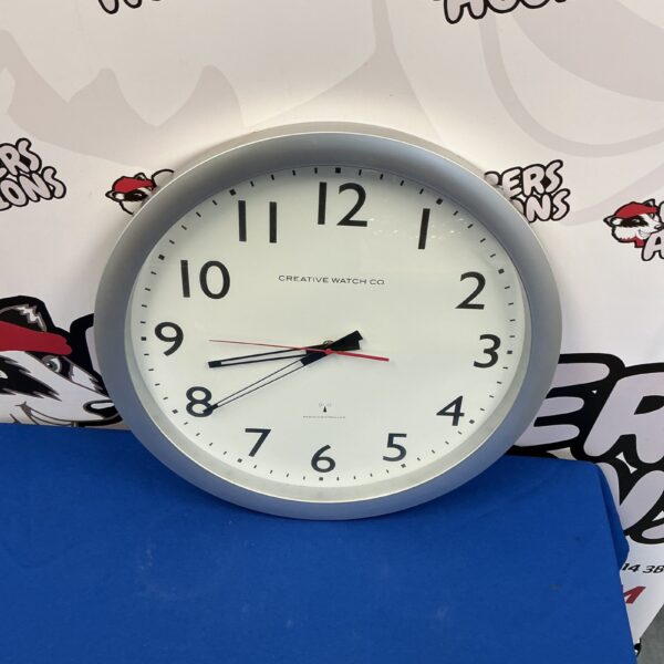 Large Creative Watch Co radio controlled wall clock for home decor.