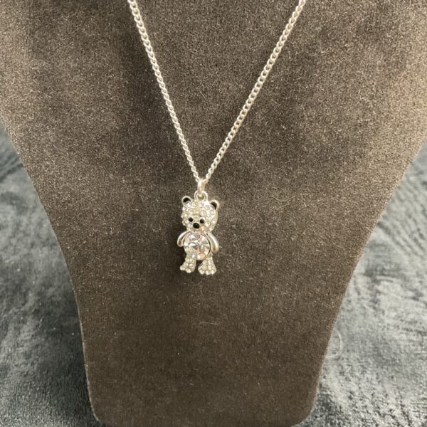 Sparkling crystal bear pendant on a delicate chain necklace.