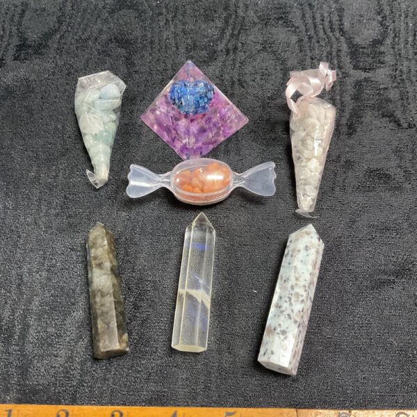 Assorted crystal collection with amethyst, quartz, and rose quartz.