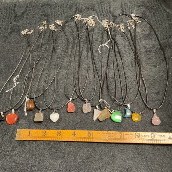 Lot of vintage crystal pendant necklaces with rope cords.