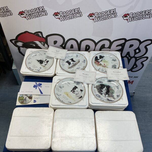 Large lot of Danbury Mint collectors plates with animal designs.