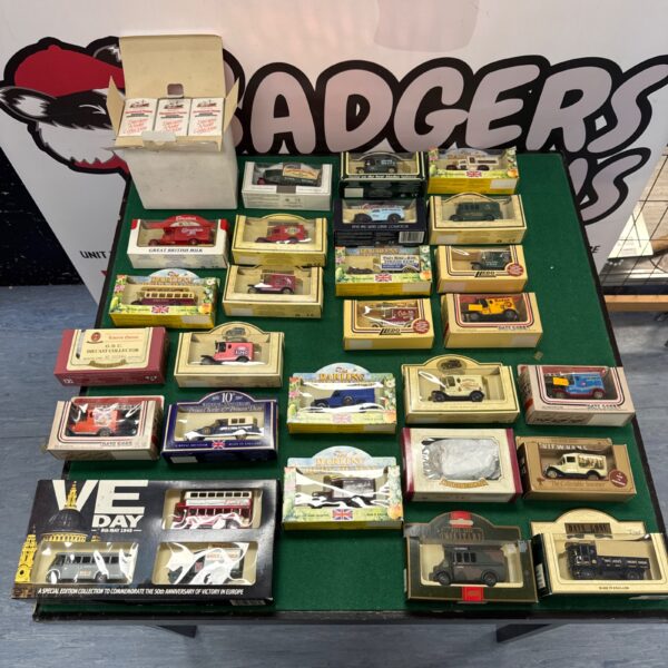 Large collection of boxed Days Gone diecast cars and vintage models.