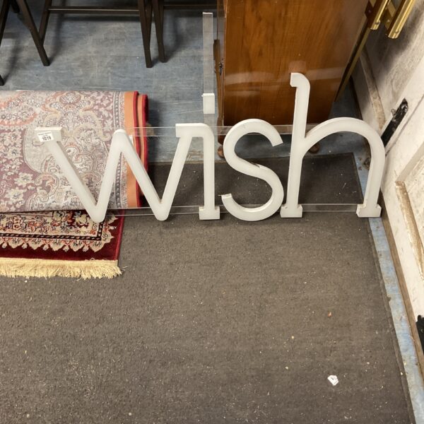 Freestanding "WISH" decorative sign with vintage appeal.