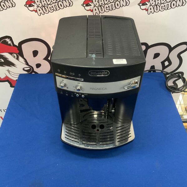 Black DeLonghi Magnifica coffee machine for brewing espresso at home.