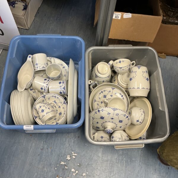 Vintage Denmark pottery dinner service with floral design.