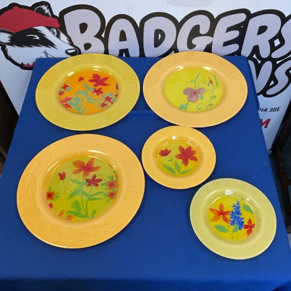 Set of five vintage Dibbern glass plates with floral design.
