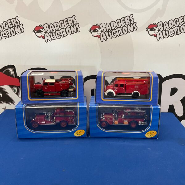 Diecast fire truck lot including Mercedes TLF-15 and other vintage models.