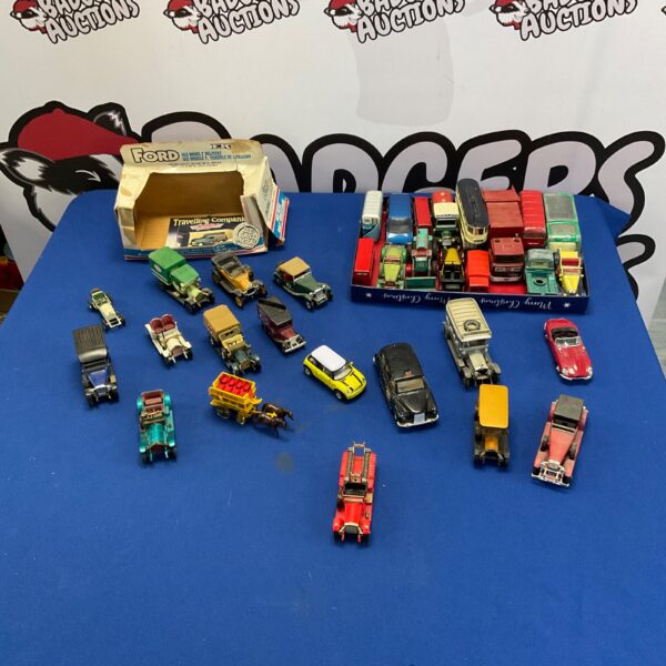 Vintage diecast model car collection including Matchbox and Corgi vehicles.
