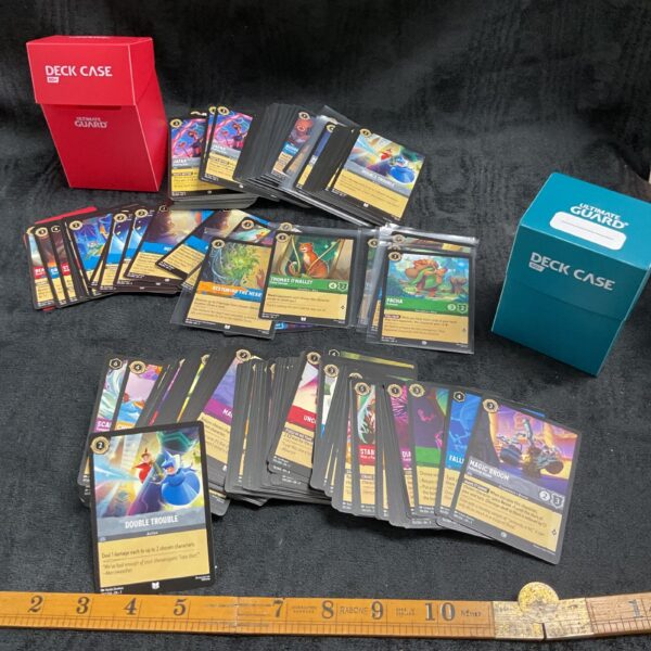 Disney Lorcana trading card sets with vibrant character art.