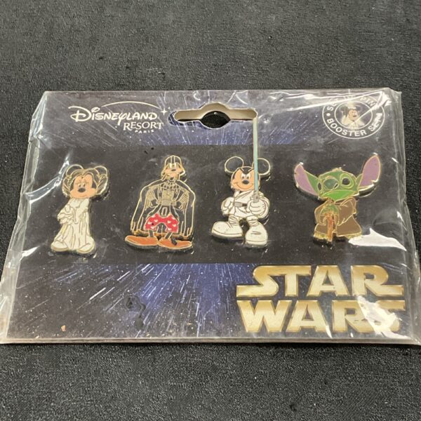 Disneyland Star Wars pin badge set featuring various characters.