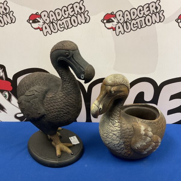 Detailed resin dodo ornament for garden or home decor.