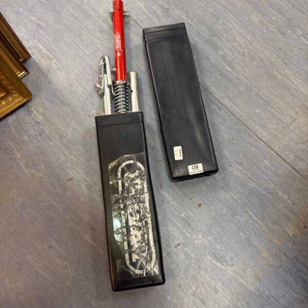 Red Draper tow bar set for vehicle towing.