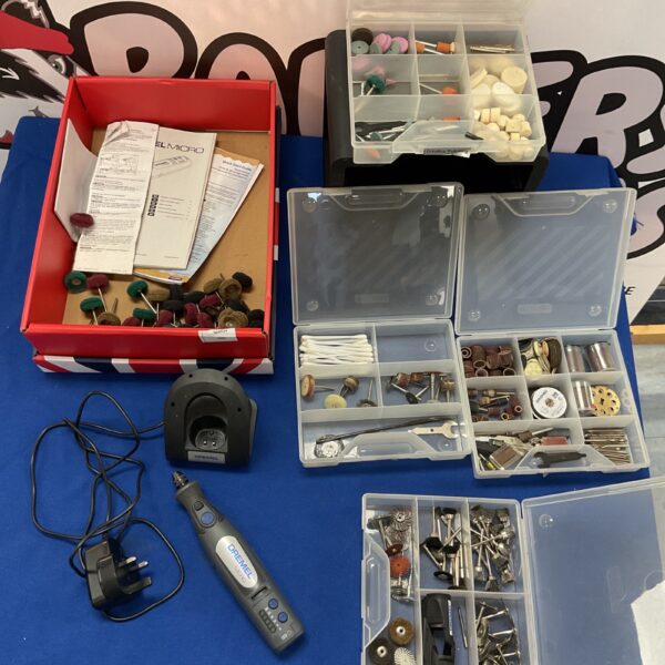 Dremel Micro rotary tool with accessory kit and charger.
