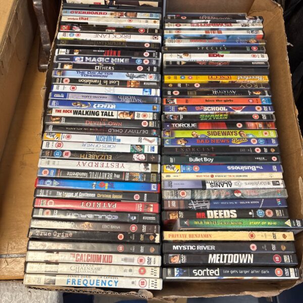 Assorted DVD lot with a variety of movie titles.