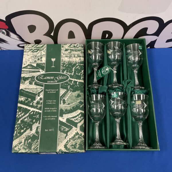 Boxed set of six hand-engraved Eamon Glass wine glasses.