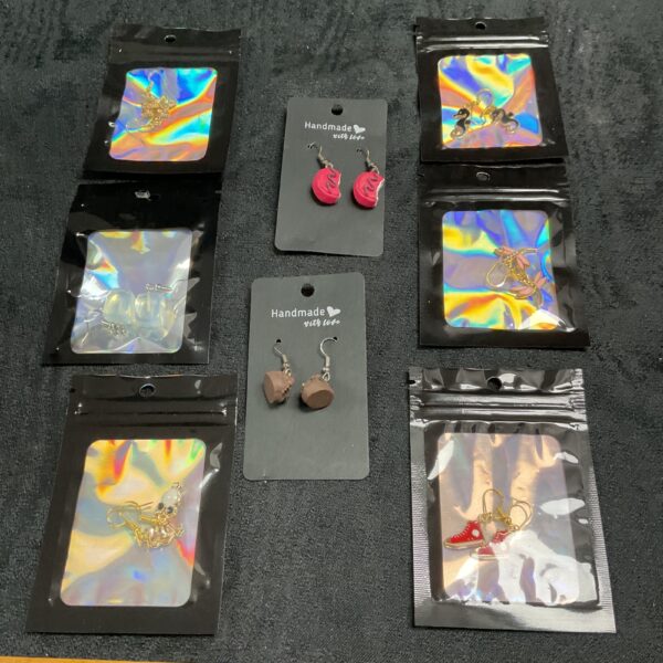 Silver-toned earrings lot, fashion jewellery collection.