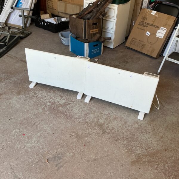 Lot of two white electric panel heaters for wall mounting.