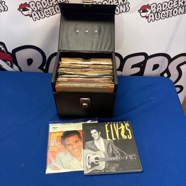 Vintage Elvis Presley record collection in a carrying case.