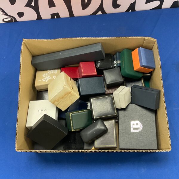 Collection of empty jewellery boxes for rings and watches.