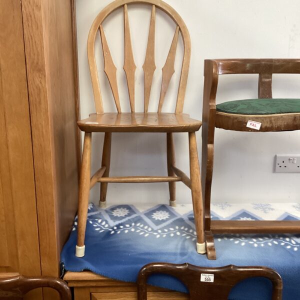 Vintage Ercol stick back chair in beech wood.