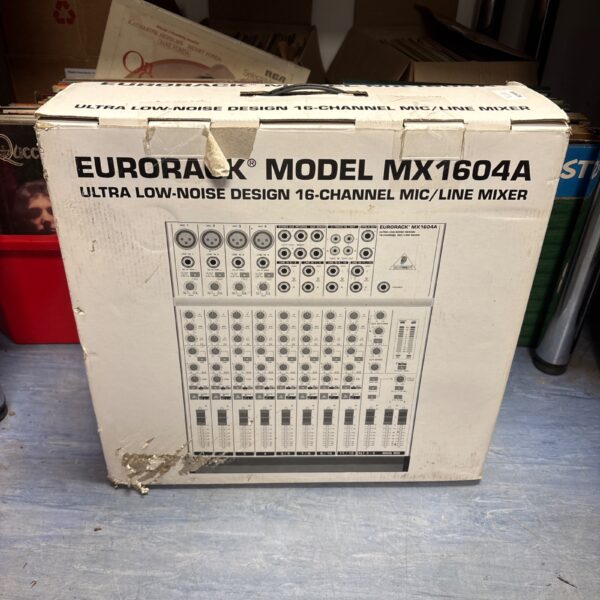 Eurorack MX1604A mixer in original packaging, audio equipment.