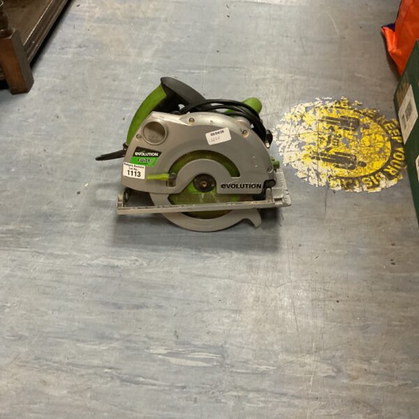 Side view of used Evolution Fury circular saw power tool.