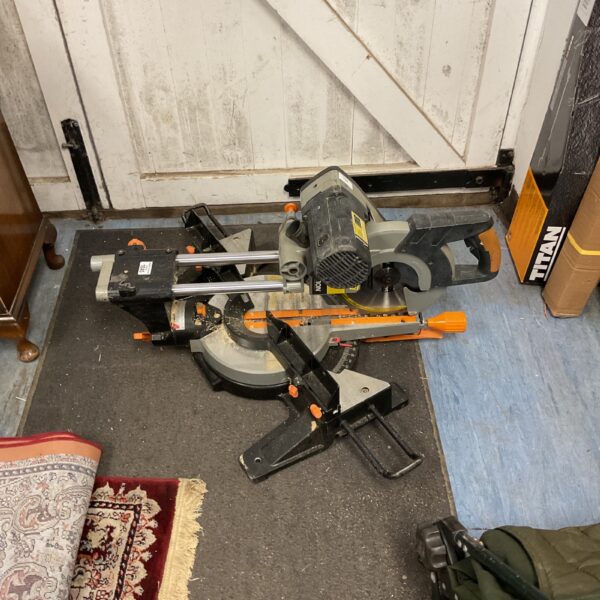 Used Evolution sliding mitre saw for woodworking projects.