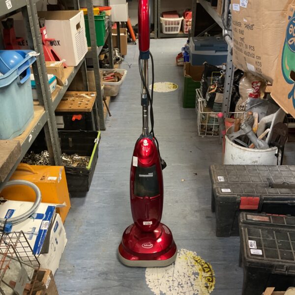 Ewbank EVP1100 floor polisher in a cluttered space.