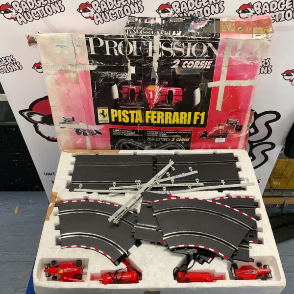 Ferrari F1 Professional Pista power racing track set in box.